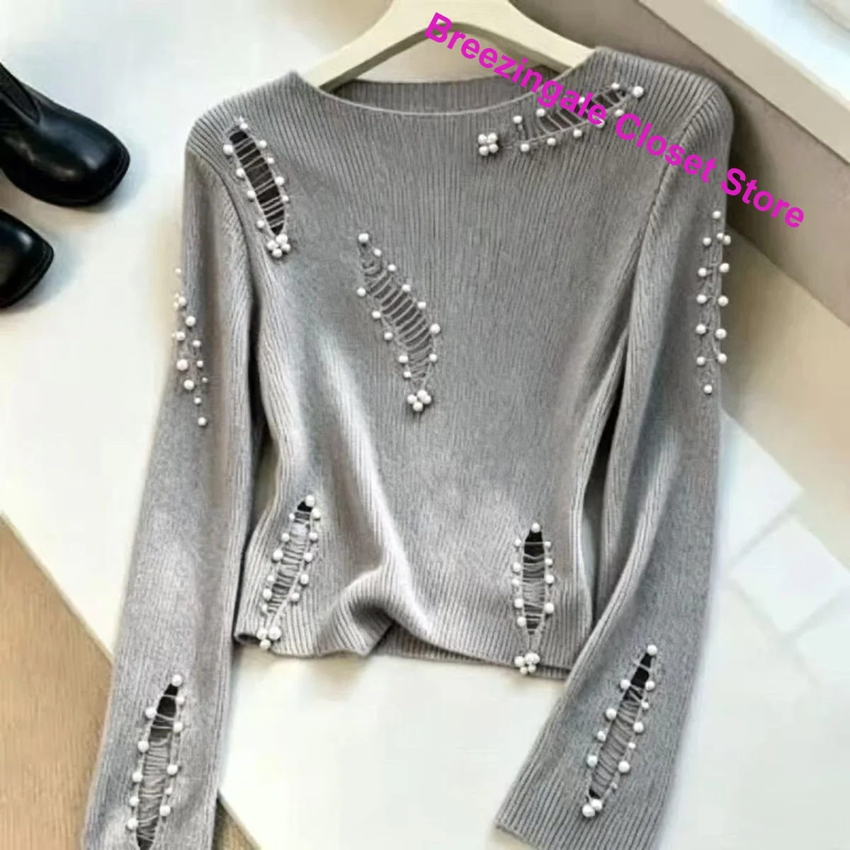 French design sense Pearl hole sweater female autumn and winter new fashion niche hollow long sleeve short casual slim sweater