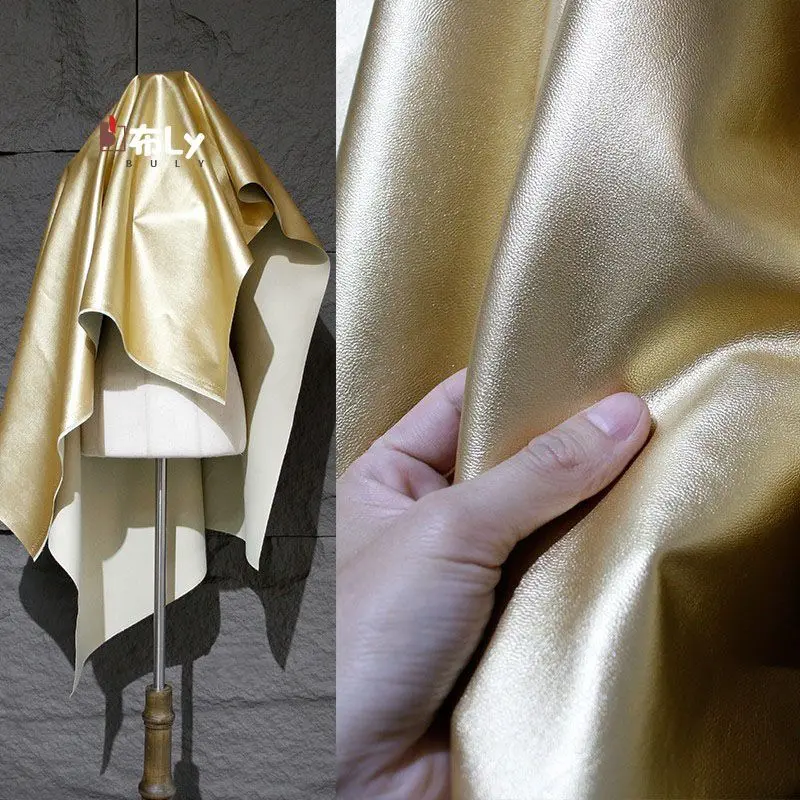 

Champagne gold PU fine grain leather handmade background fabric soft leather stretchless high-end clothing designer fabric