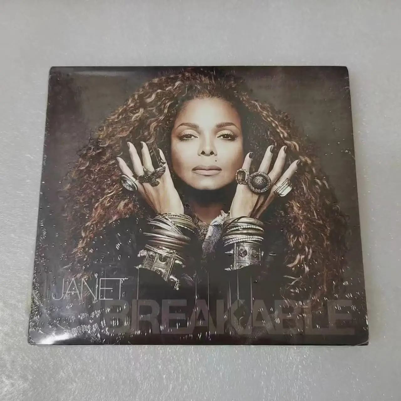แผ่นซีดีเพลง JANET JACKSON UNBREAKABLE อัลบั้มเพลงฮิต แผ่นเสียงเพลง คอสเพลย์ เครื่องเล่นเพลงแบบพกพา ซาวด์แทร็กในรถยนต์ กล่องดนตรีสำหรับงานปาร์ตี้