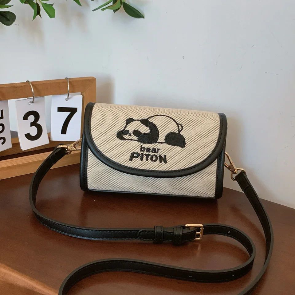 

2025 New Women's Canvas Embroidery Bag - Cute Pet Panda Doll Single Shoulder Armpit Flip Small Square Bag