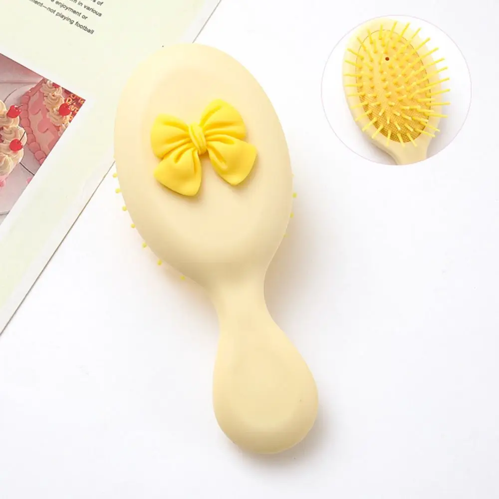 

Simple Handle Cartoon Air Comb Anti Static Scalp Massage Portable Comb Girl Heart Blood Circulation Smoothly Bow Comb Women