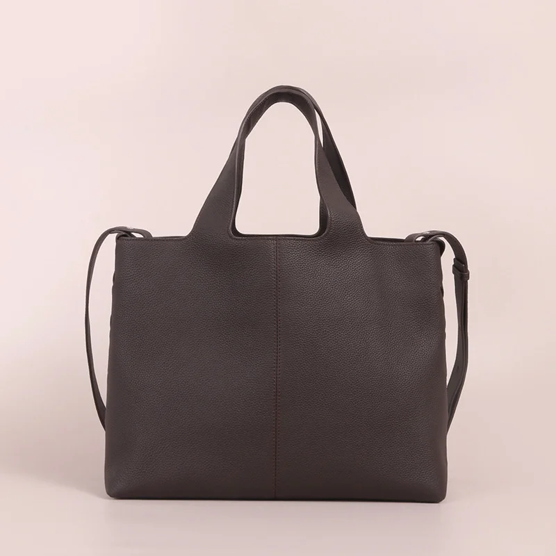 2026 Nieuwe Toplaag Koeienhuid Grote Capaciteit Draagtas Dames Eenvoudige Casual Geweven Crossbody Tassen High-End Lederen Commuter handtassen