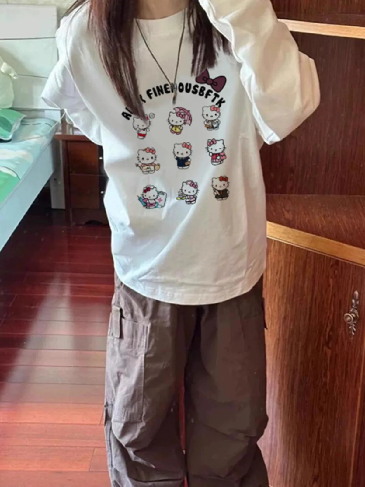 Süßes, langes Sve-T-Shirt aus reiner Baumwolle mit Kit-Print, vielseitiges, lockeres, schlankmachendes, lässiges, mittellanges Oberteil