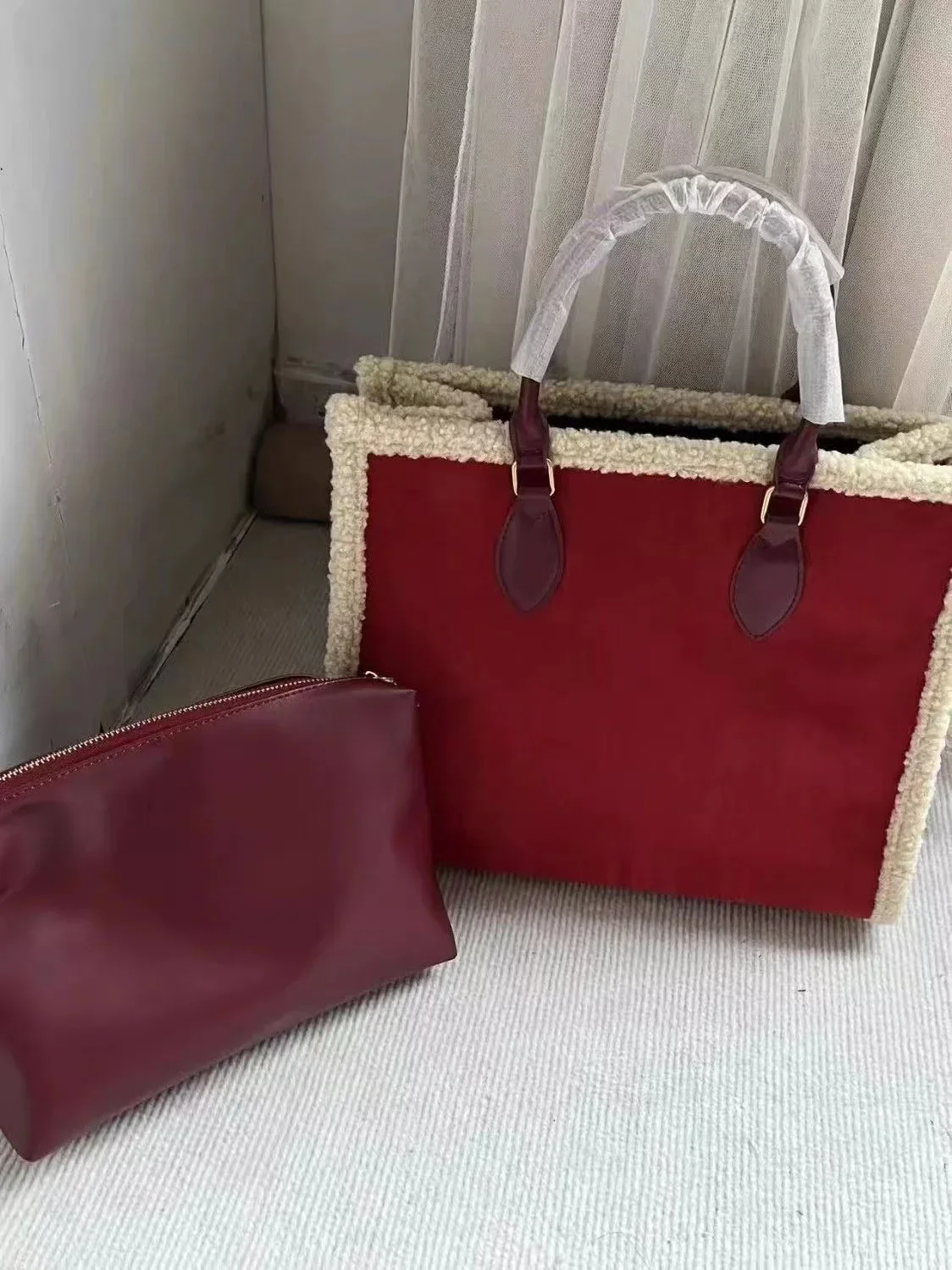 Chic Tote Bag Burgundy Suede Contrasting Wool Trim Elegant Leather Handles Spacious Interior Fashion-Forward Design Practical