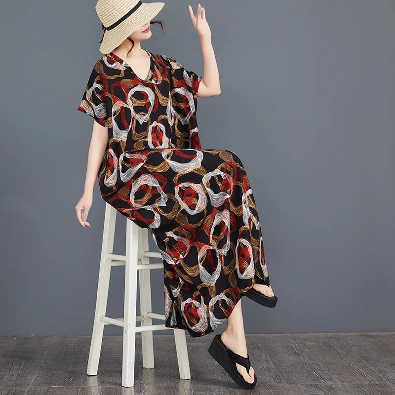 Gaun katun sutra longgar model batwing dengan kerah V, motif print, untuk wanita, cocok untuk liburan musim panas, dengan lengan panjang lurus.