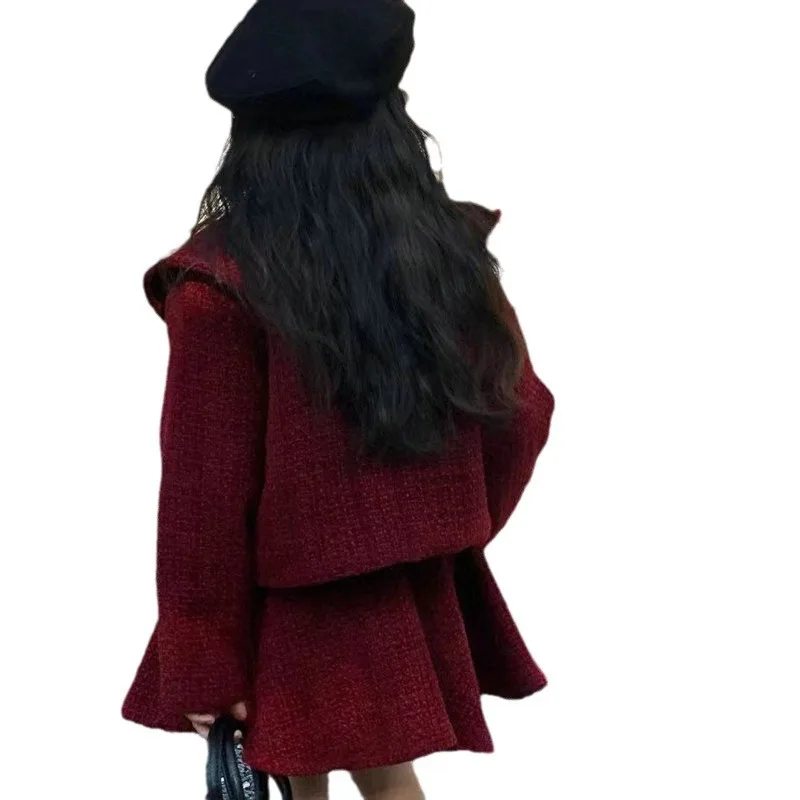 2025 شتاء جديد مجموعة ملابس الفتيات مزاجه مشبك واحد نسيج الصوف مع سترة قطن سميكة + تنورة الاطفال الدعاوى