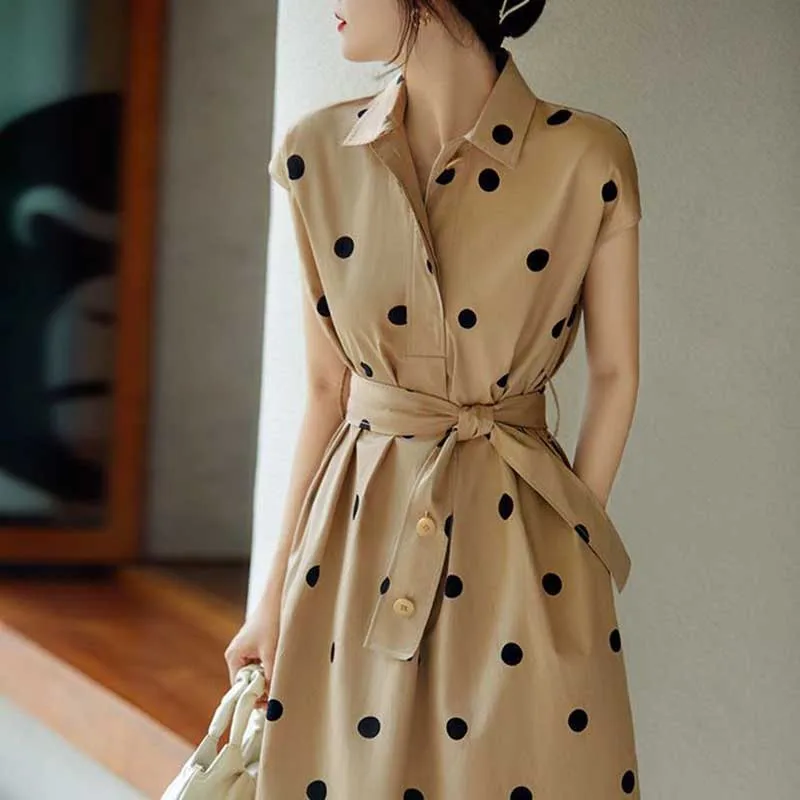 Moda tasche con risvolto fasciatura senza maniche a pois abiti Casual abbigliamento donna 2024 estate nuovo vestito longuette da pendolare allentato