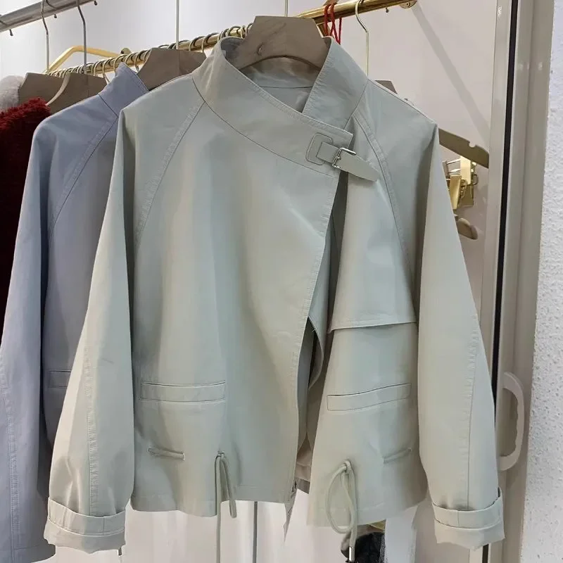 Women Stand Collar Trench Jacket Asymmetric Buckle Strap Drawstring Loose Short Windbreaker Coat Pocket Casual Ladies Outerwear