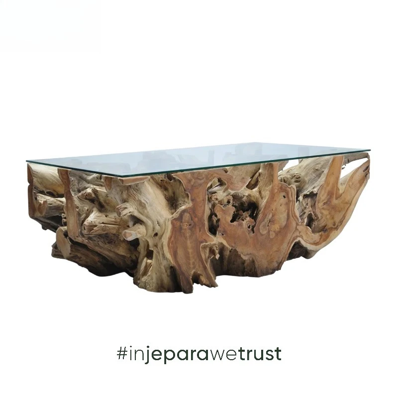 The hand-crafted teak root coffee table is a unique natural decoration in the living room, featuring an environmentally friendly