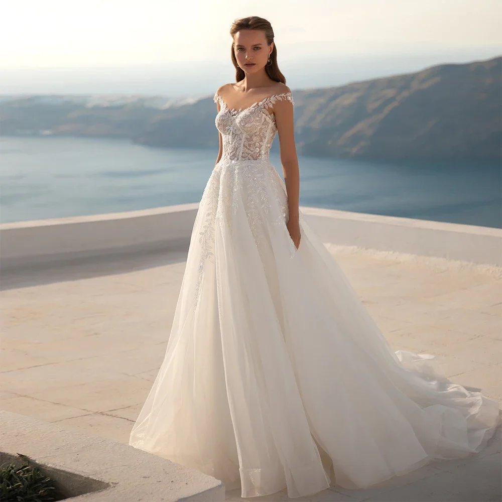 فساتين زفاف مثيرة بدون حمالات على شكل حرف a منخفضة على شكل حرف V من الخلف الوهم فساتين زفاف مزينة بالزهور مطرزة حسب الطلب فيستدوس دي نوفيا