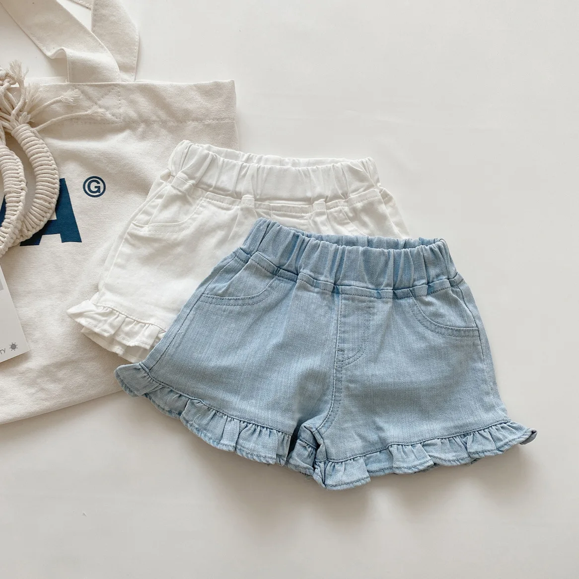 Girls' stylish soft denim shorts 2025 summer new Korean baby ear fungus edge hot pants children's fashionable pants