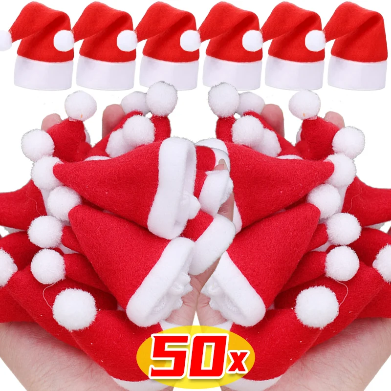 หมวกอมยิ้มผ้าใยสังเคราะห์ขนาดเล็กสำหรับหมวกซานตาคลอส, ที่คลุมขวดไวน์คริสต์มาสที่วางขวดตกแต่งโต๊ะอาหารค่ำ50/1ชิ้น