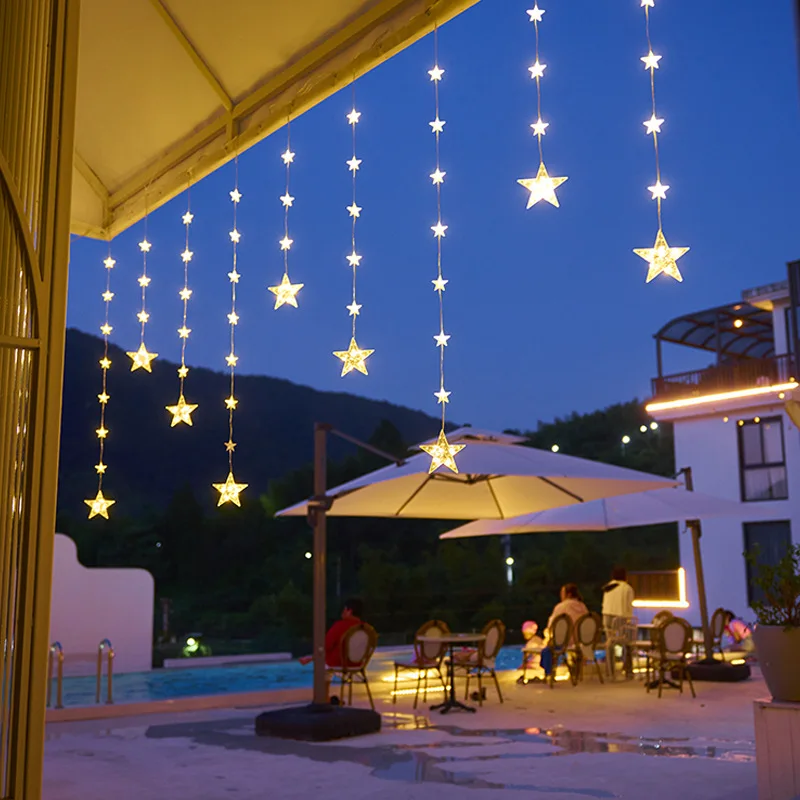 星と月の形をしたledストリングライト。ソーラー充電式で、屋外での使用に適しており、ゲストハウスなどの装飾照明として最適。