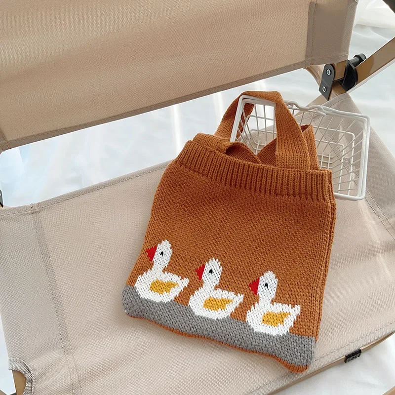 Bolso pequeño de punto con dibujos de pato para niños y niñas, bolsa de almacenamiento portátil para aperitivos y monedas, estuche para Otoño e Invierno