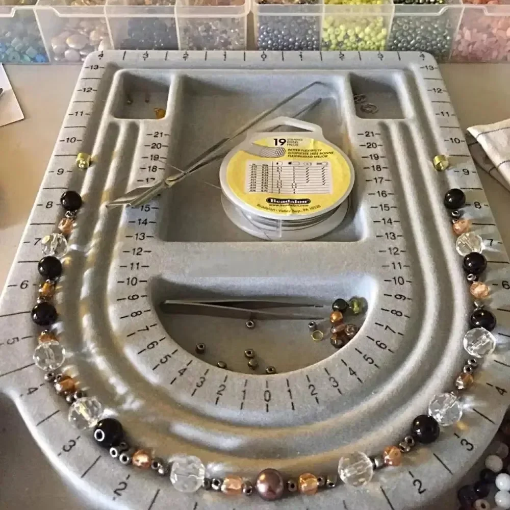 Jewelry Beading Board with Non-Slip Gray Flock Surface and Protective Storage Lid for Professional Bead Design and Crafting