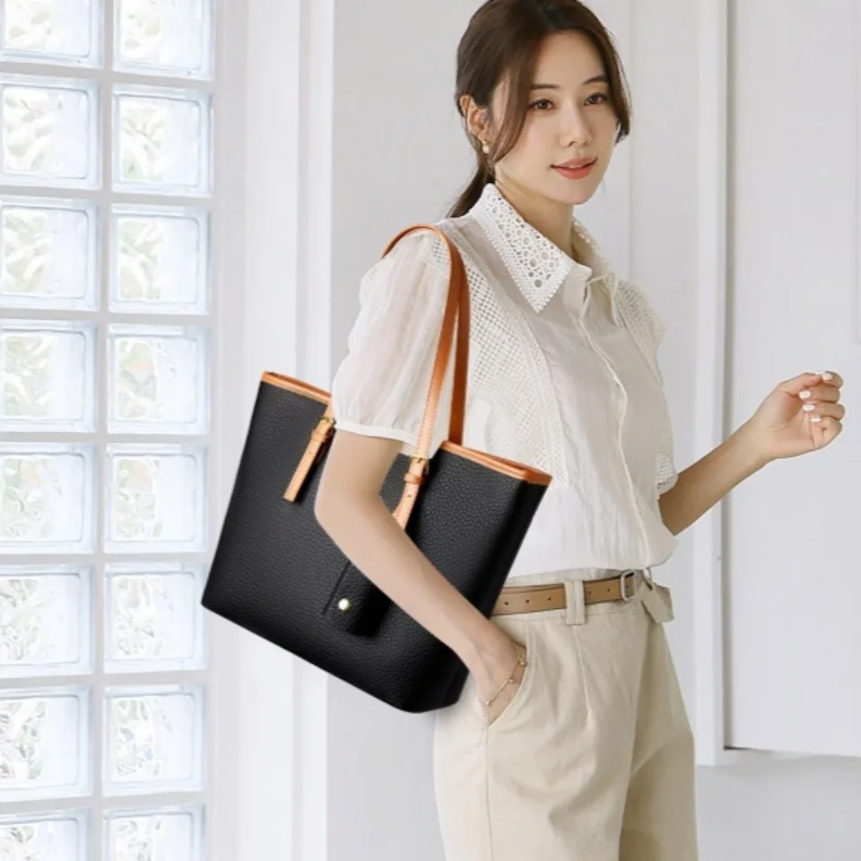 Bag worn on shoulder in urban setting