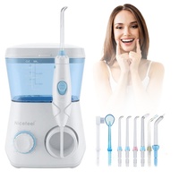 Portable Dental Irrigator Water Flosser Tooth Cleaner with 8 Nozzles Adjustable Pressure for Deep Cleaning Bad Breath Prevention