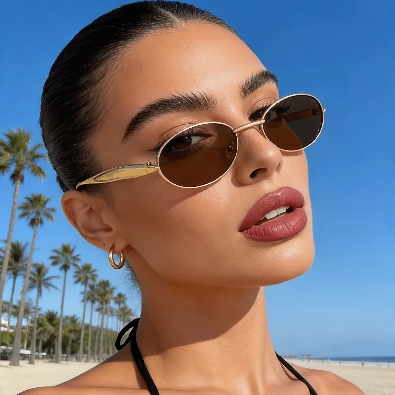 Modische Retro-Sonnenbrille für Damen mit kleinem Metallrahmen und ovalem Design, geeignet für den täglichen Gebrauch und Freizeitaktivitäten.