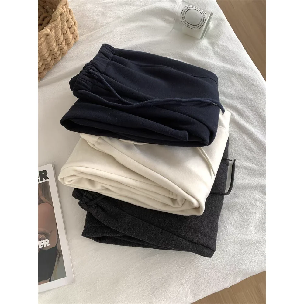 กางเกงขายาวทรงตรงผ้าวูลสำหรับผู้หญิง สไตล์ลำลอง อุ่นสบาย ความยาวเก้าส่วน ทรงขากว้าง ช่วยให้ดูผอมเพรียว เหมาะสำหรับคุณแม่ ใส่ได้ในฤดูใบไม้ร่วงและฤดูหนาว