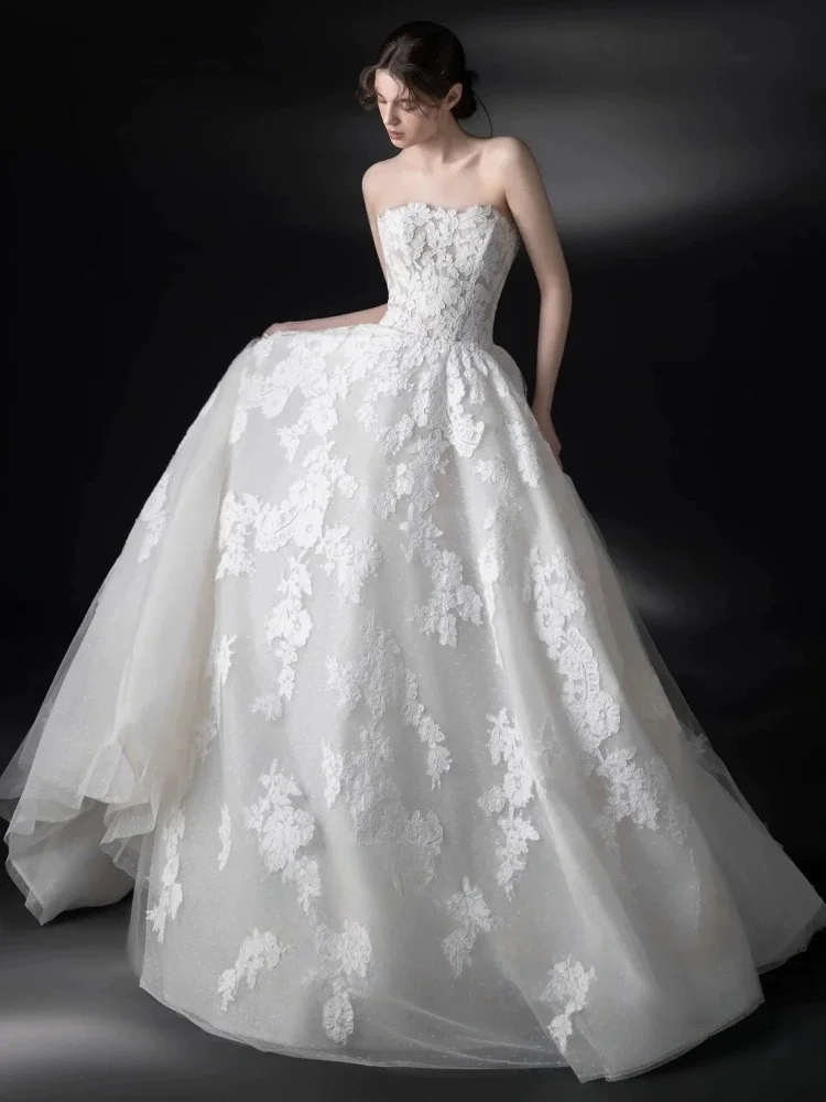 

Customized 2026 Elegant Ivory Lace A-Line Wedding Dress Strapless Lace Evening Dresses