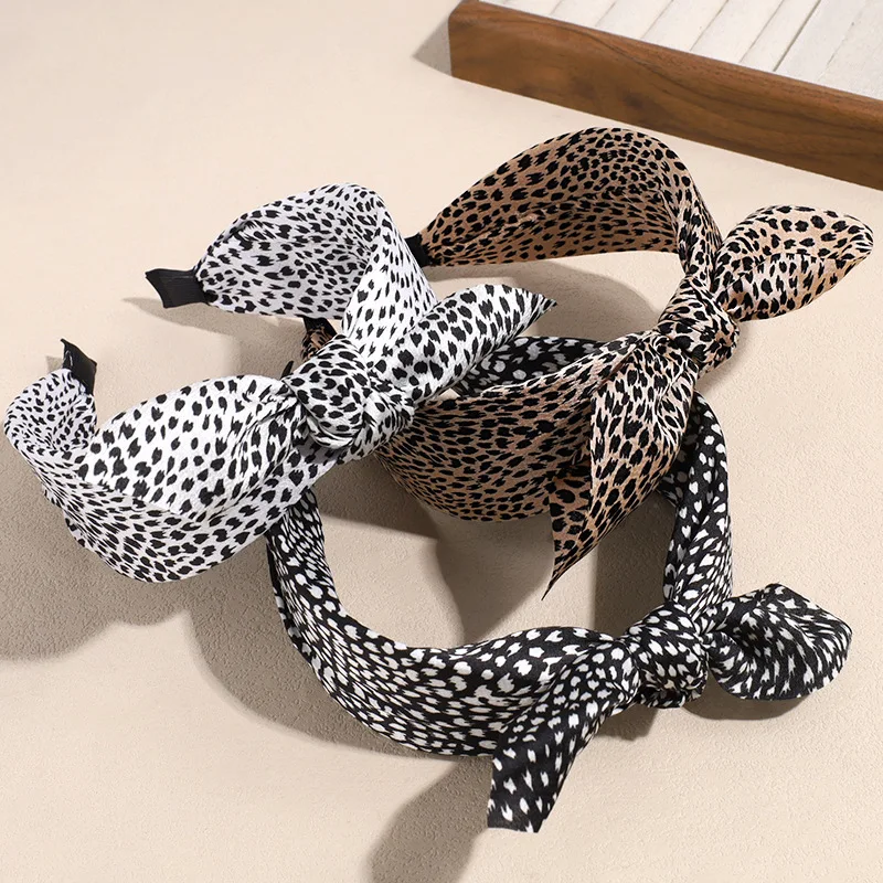 1 Stück koreanische Version Haarband mit Leopardenmuster und Schleife, Retro-Haarband mit Zähnen, breiter Rand, rutschfest, zum Waschen von Gesicht und Haaren, weiblich