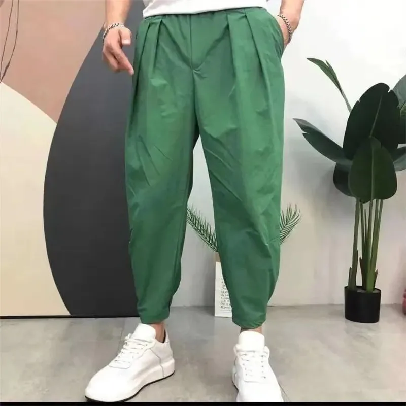 Pantalones elásticos holgados para hombre, ropa informal de seda de hielo de nueve puntos, moda coreana, Color sólido, combina con todo, novedad de verano 2024