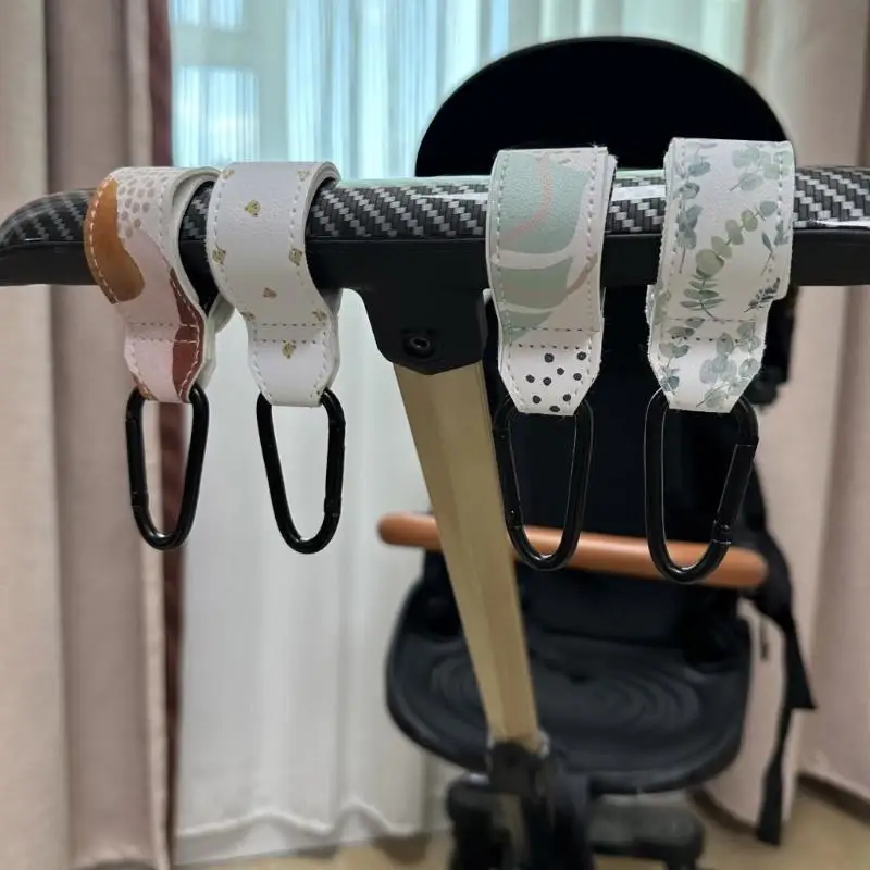 

Вешалка-органайзер с крючками для колясок из сплава с нескользящими застежками для сумок для подгузников, продуктов и устройств