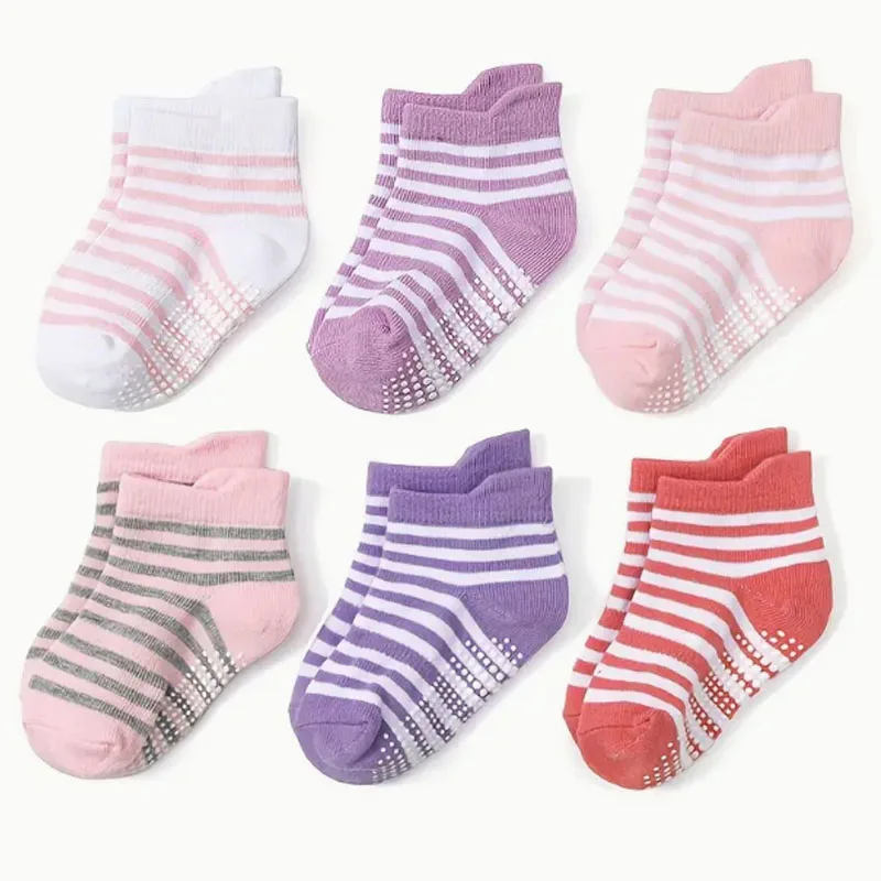 6 pairs of girls' anti slip socks, adhesive point socks, and short socks with anti drop heel design at the back. Girls'