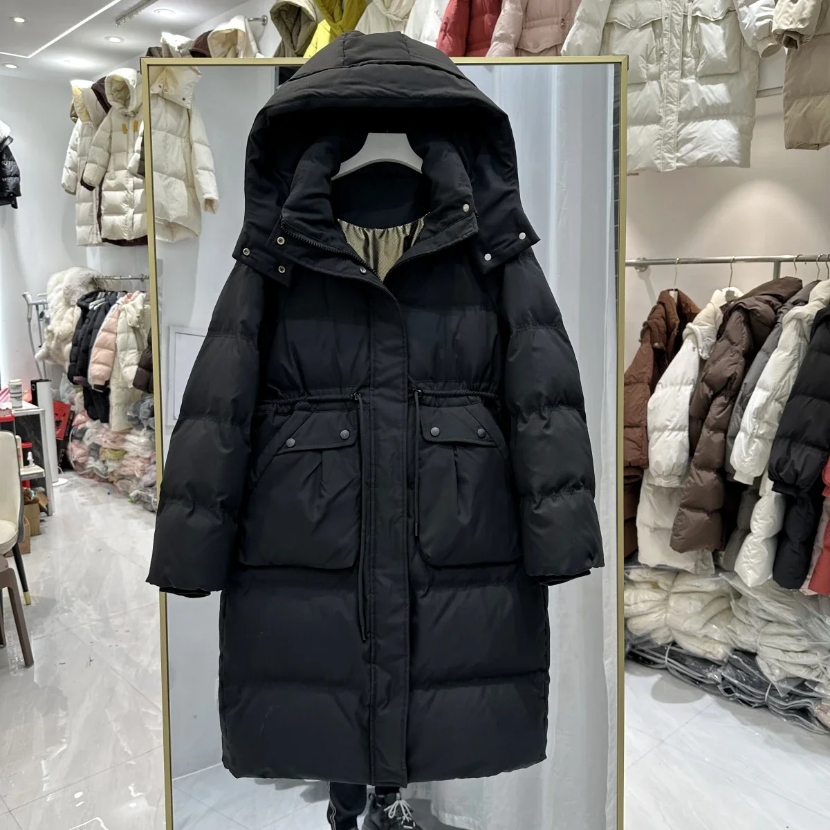 Damska kurtka puchowa na jesień i zimę 2025, średniej długości, za kolano, z kapturem, parka, gruba, ciepła, z białego puchu kaczego.