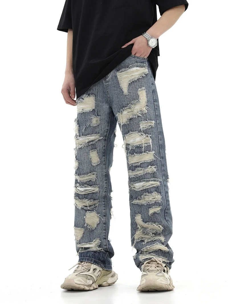 

2023 American style high street washed personalized torn hole cut straight tube loose fitting jeans, versatile for men and women