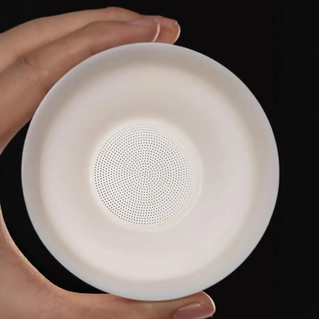 Mutton fat jade white porcelain all-in-one full ceramic hole tea drain ceramic tea set accessories tea filter tea maker