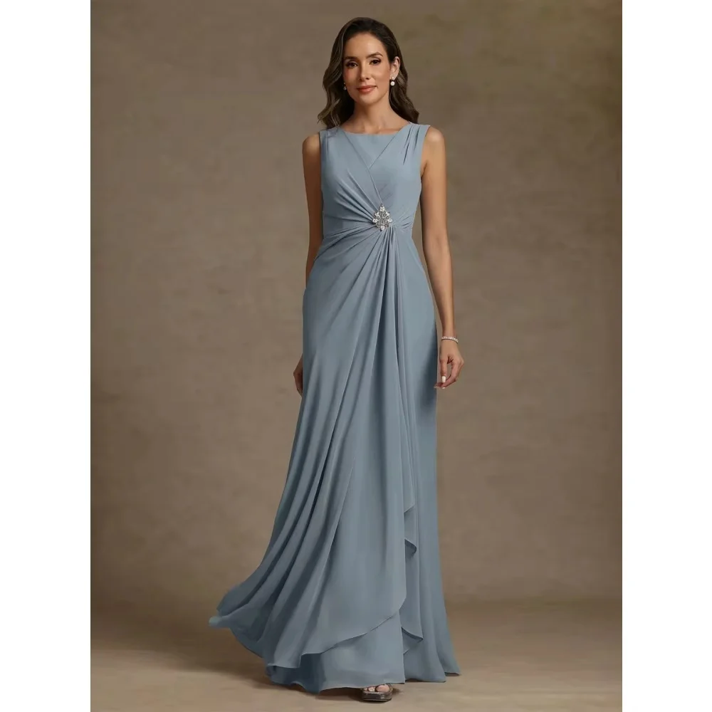 Sleeveless round neck long evening gown with twisted waist and decorative rhinestones, side slit design. Custom sizes available