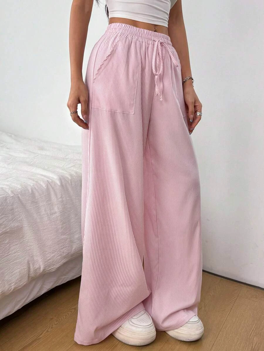 

Женские повседневные широкие брюки в полоску с карманами и завязками