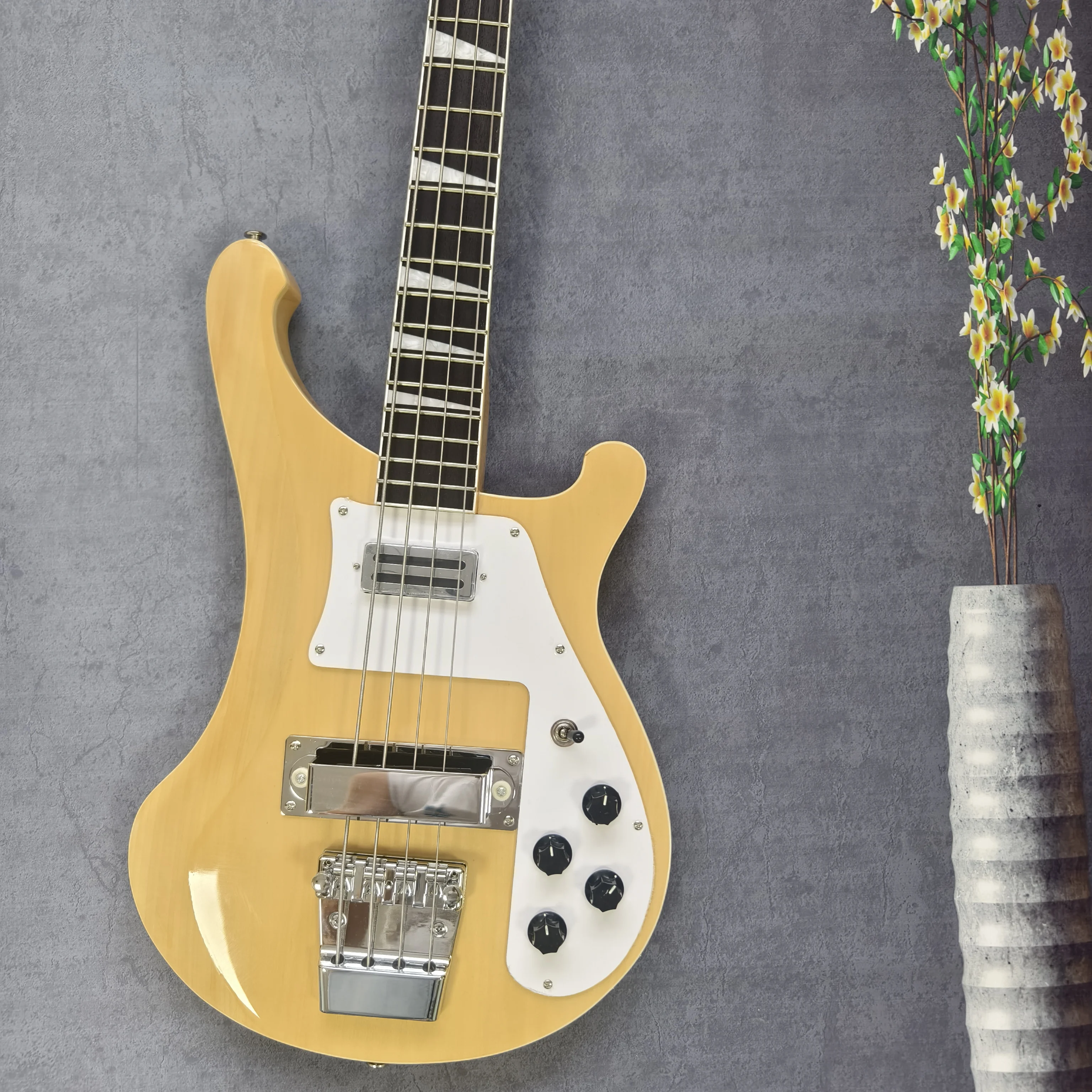 

Natural Wood 4-String Electric Bass Guitar with Chrome Hardware & Pickguard