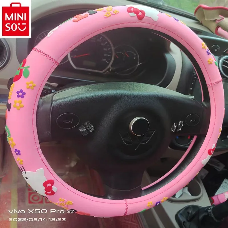 

MINISO 2024 high-quality silicone steering wheel cover for women, fashionable cartoon Hello Kitty cute anti slip handle cover