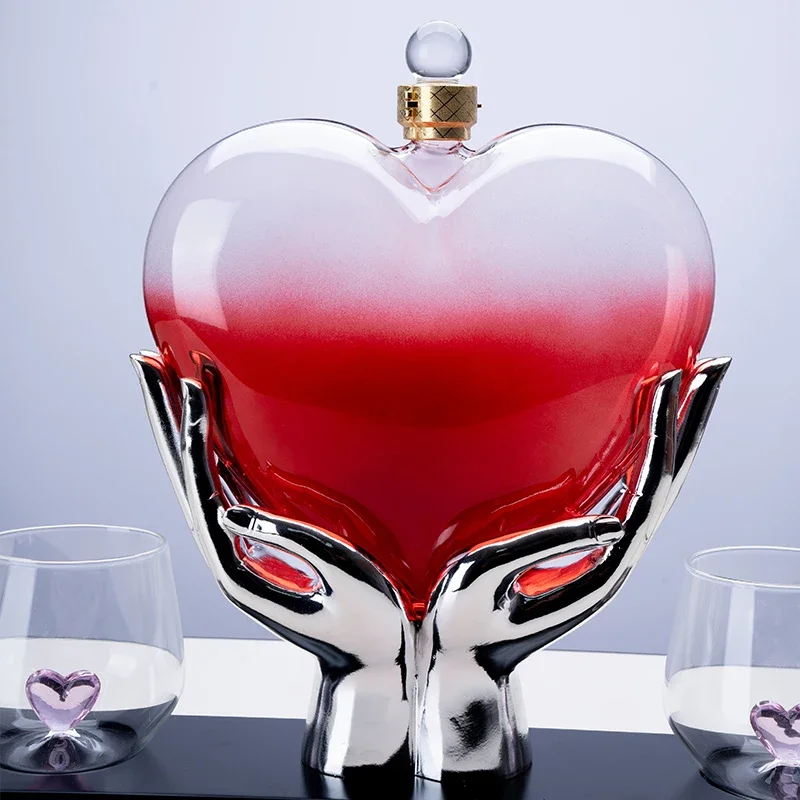 Handmade glassware heart-shaped whiskey bottle set with two glasses of whiskey vodka brandy