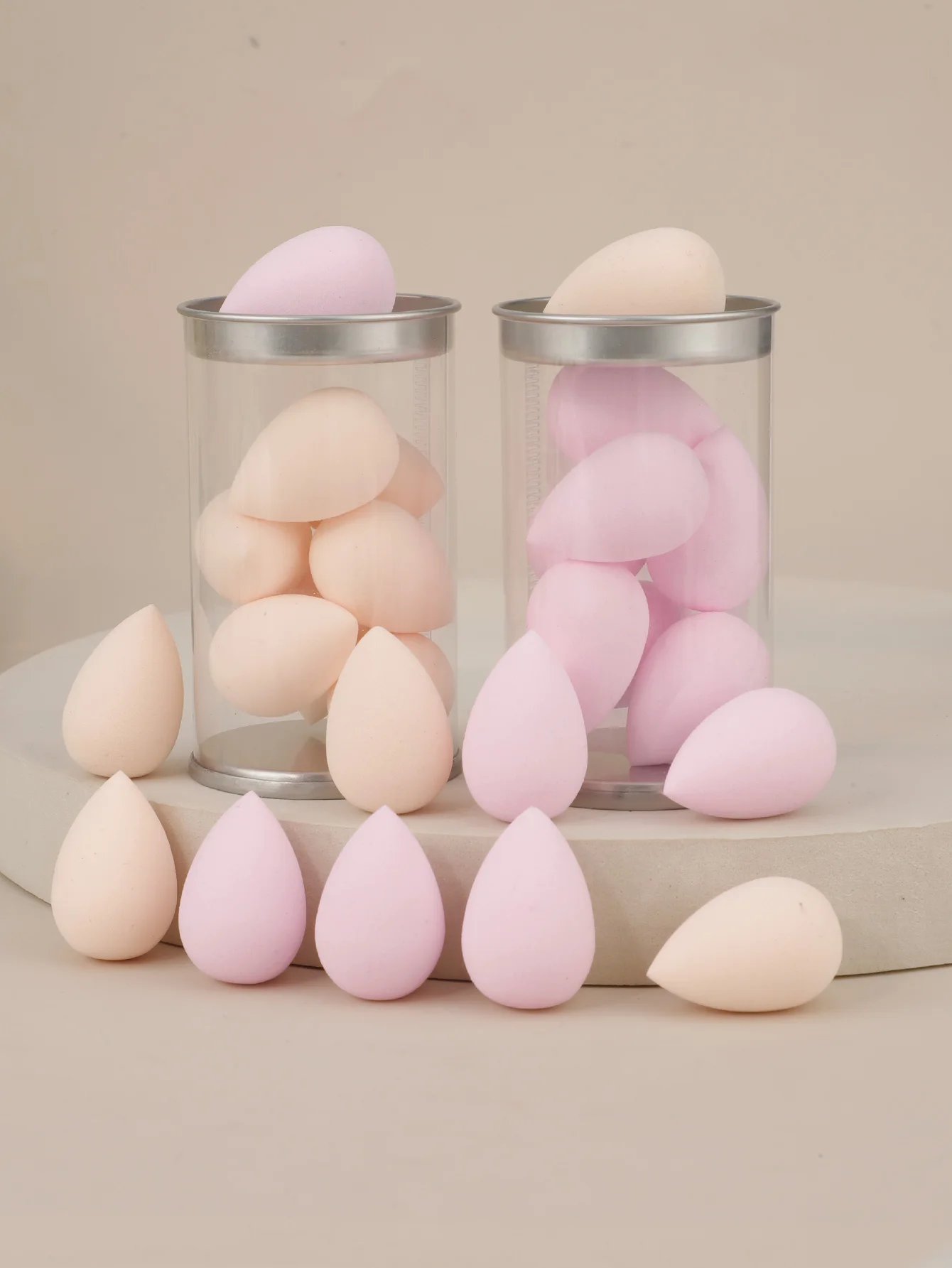 بيض تجميل صغير مع علبة تغليف بلاستيكية شفافة أسطوانية PVC