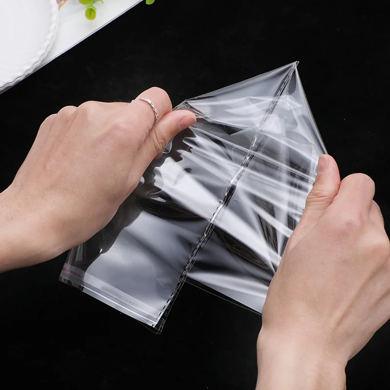 TETP 100Pcs Self Adhesive Bag With Glued Edge Home Travel For Clothes Towel Book Storage Packaging OPP Plastic Bag Cellophane