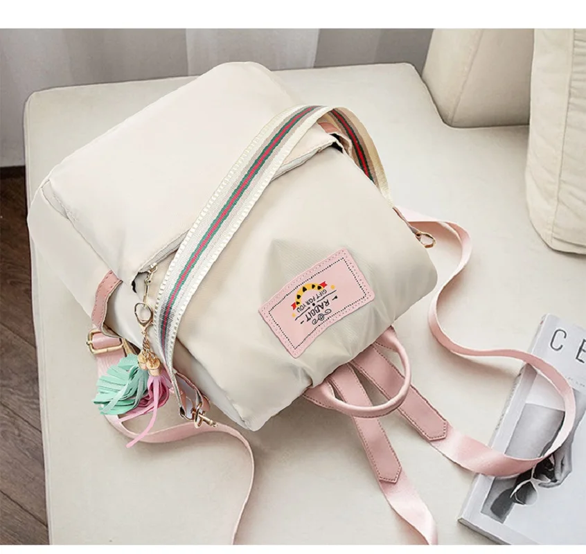 New Fashion Large Capacity Minimalist Backpack Outdoor Travel Shoulder Bag Student School Bag Tassel Pendant Casual Backpack