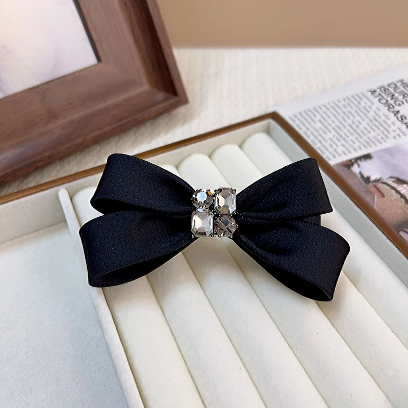 

Korean Elegance Black Rhinestone Bow Spring Hair Clip Chic Bowknot Hairpin Stylish Fashion Hair Accessory for Women