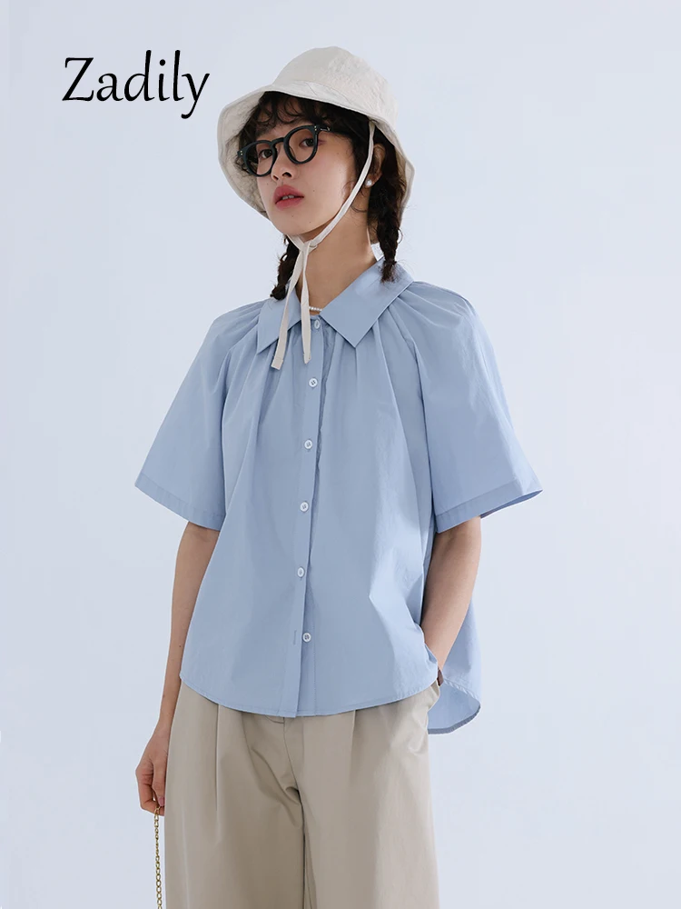 Zadily-Blusa de manga raglán corta para mujer, camisa blanca de algodón, estilo coreano, con pliegues y botones, para el trabajo, verano, 2023