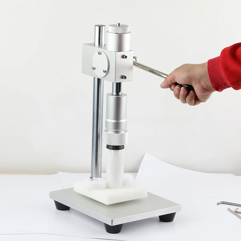 Máquina manual de selagem de garrafas de perfume, máquina perfuradora de travamento de garrafas de óleo essencial, máquina tampadora, atomizin de vedação
