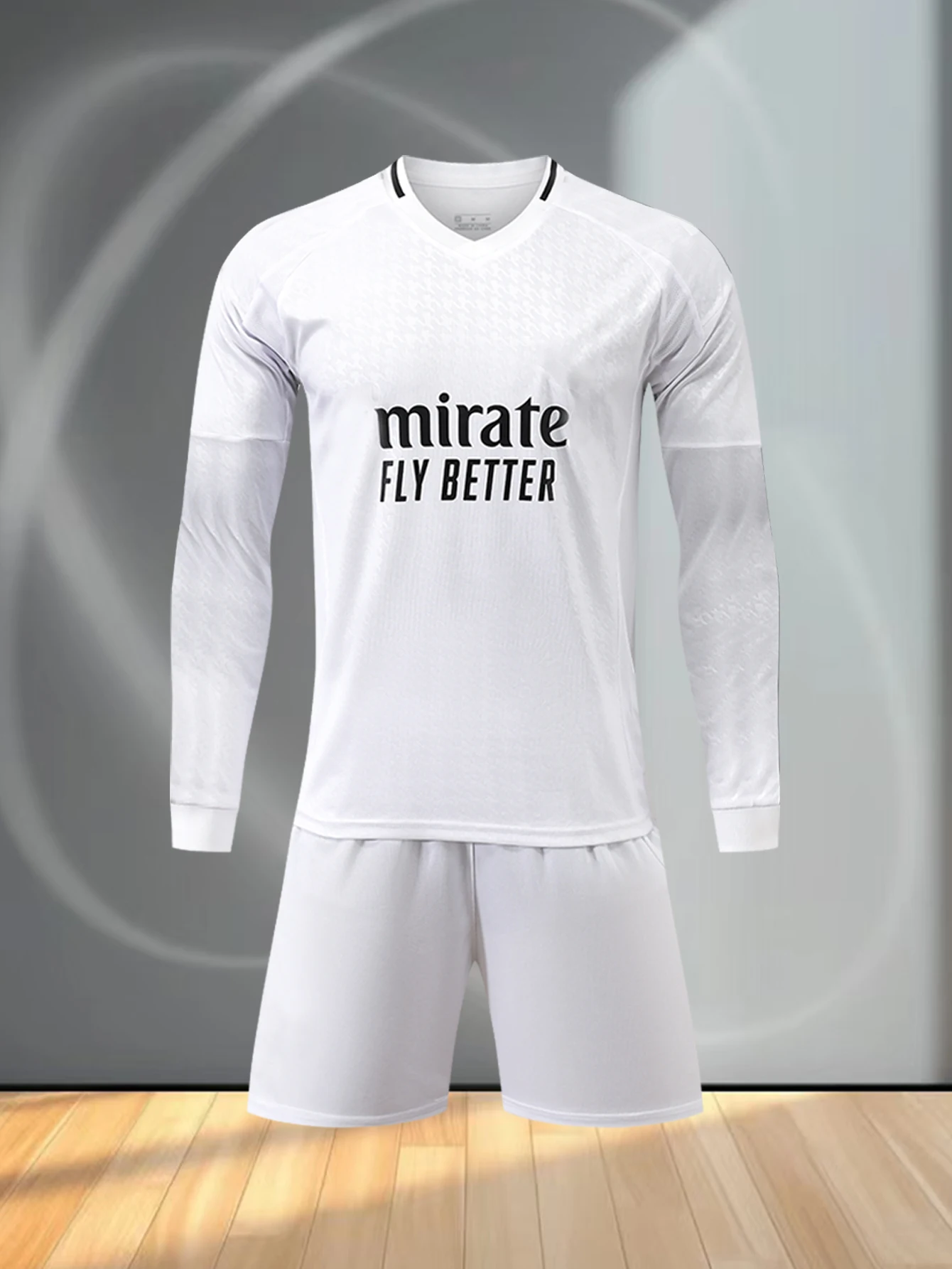 Long - sleeve breathable football kit with top and pants for warm seasons