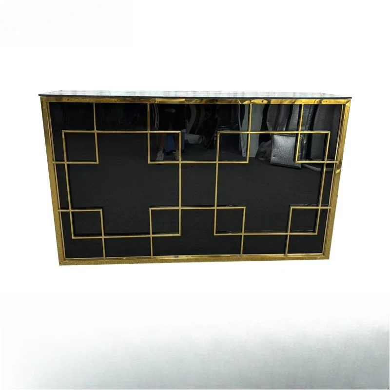 

Stainless steel table with gold trim, black table
