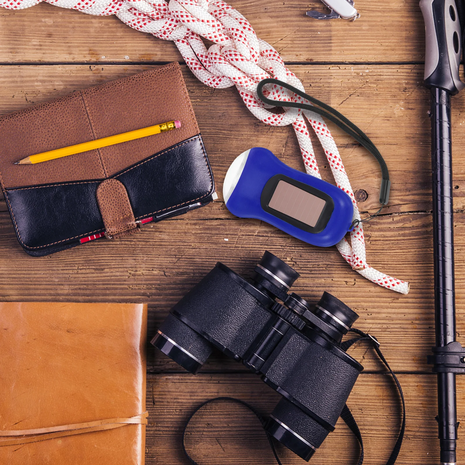 

Blue Hand Crank Solar Powered Flashlight Compact Outdoor Light for Hiking Camping Emergency Use Sustainable Energy Efficient