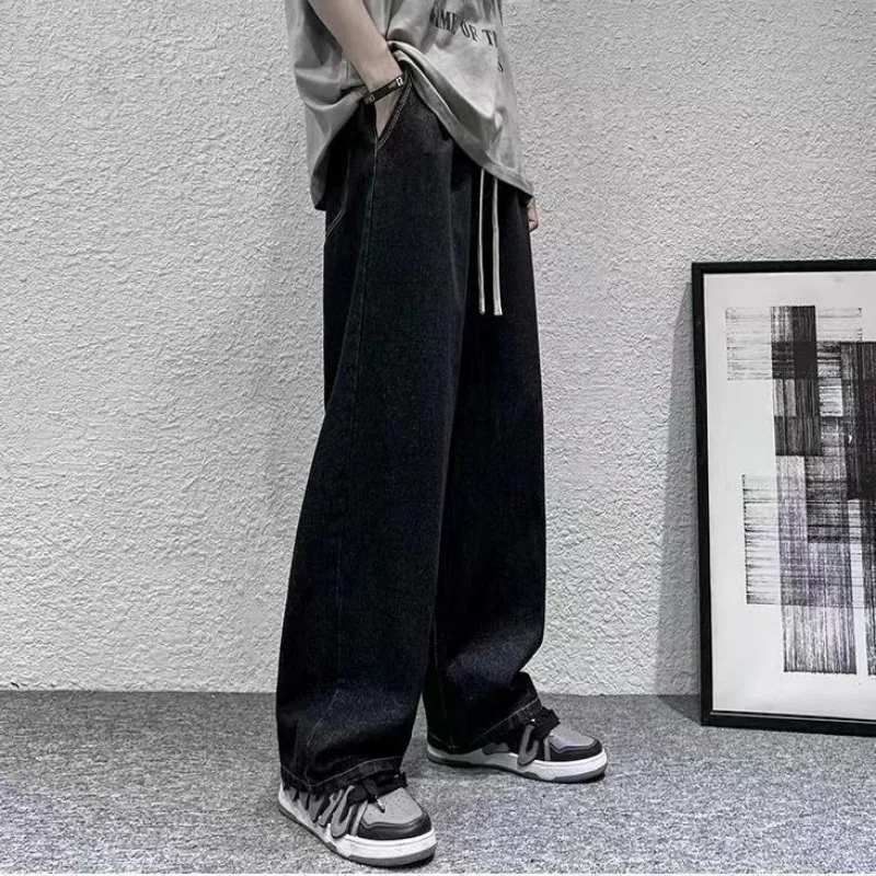 กางเกงยีนส์ผู้ชายลำลองกลางแจ้งเอวยางยืดทรงหลวมกางเกงขายาวฤดูใบไม้ผลิฤดูใบไม้ร่วงชุดทำงานสบายขาตรงผ้ายีนส์สีน้ำเงิน