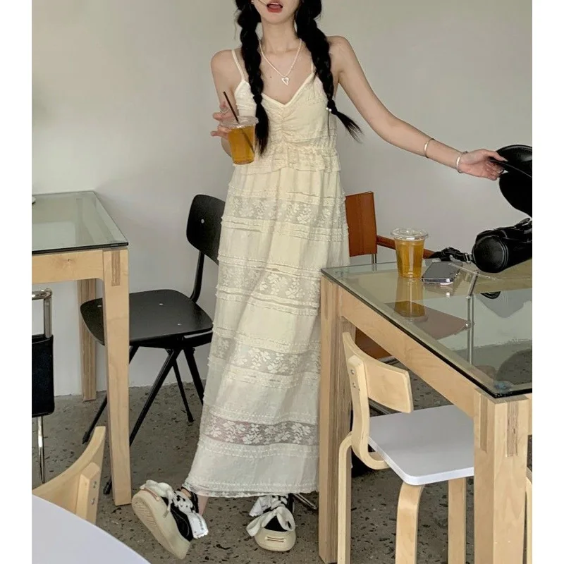 

2023 New Summer Loose Fitting Casual Lazy Gentle Style Lace V-neck Hollowed Out Strap Seaside Vacation Style Women's Long Dress