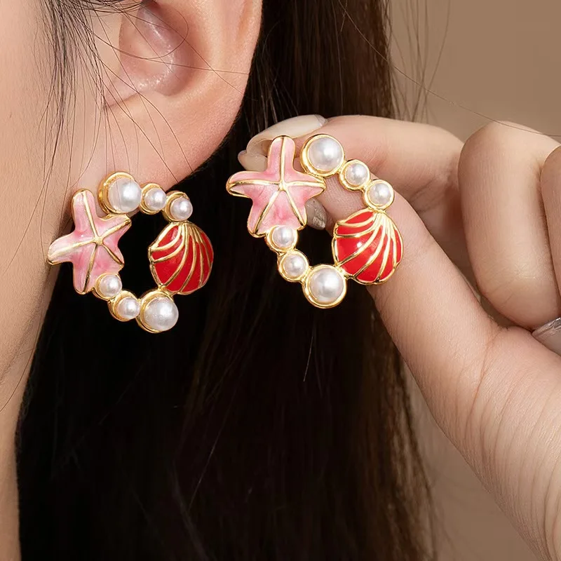 

Elegant Pearl-Embedded Star Shell Drop Earrings Luxury Sensation Alloy Jewelry for Women Perfect for Daily Parties Unique Access
