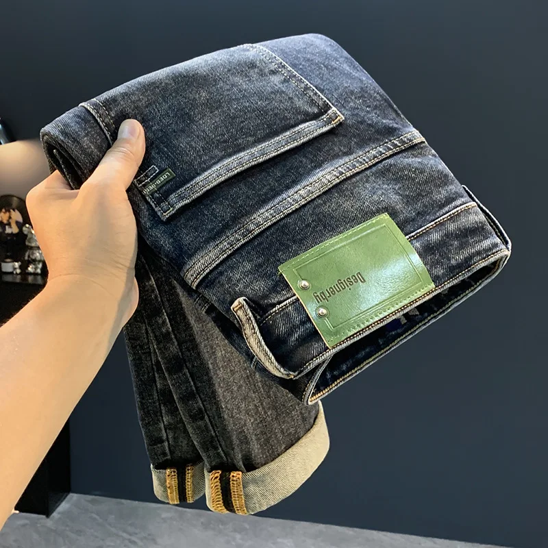 

Новинка 2023 года, джинсы для пирсинга Micro Haren для мужчин, тренд осенней моды, повседневные эластичные брюки с конической маленькой ногой