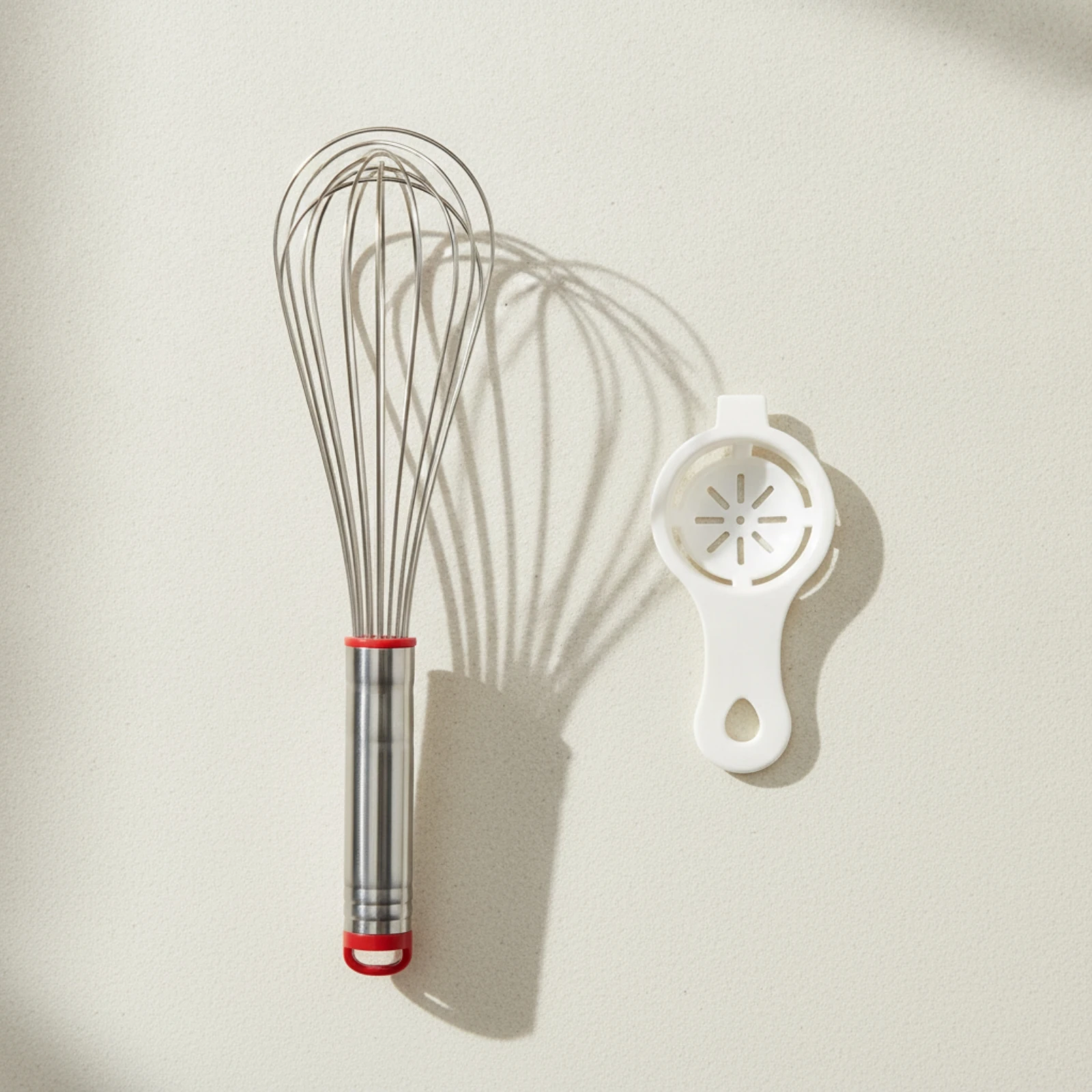 ที่ตีไข่แบบยืดหยุ่นพร้อมที่แยก - Egg Separator Tool บทวิจารณ์และราคา